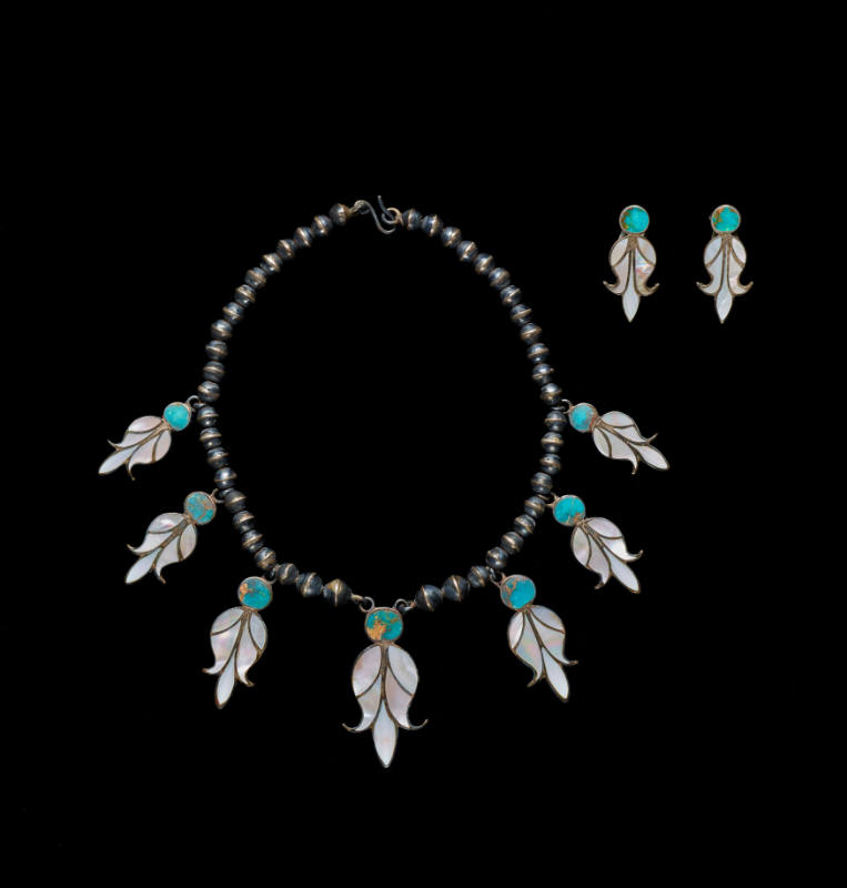 From left to right: Necklace (A) and Earrings (B, C)