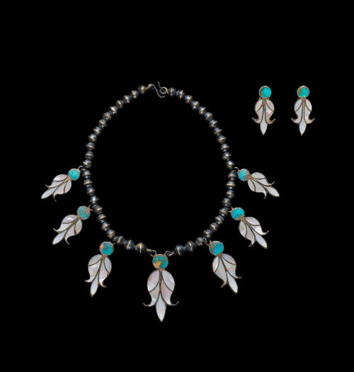 From left to right: Necklace (A) and Earrings (B, C)