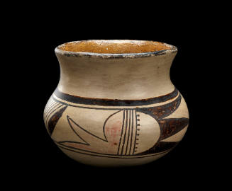 Jar with rain bird designs