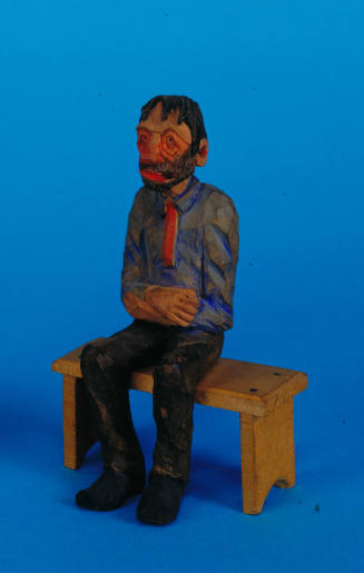 Old Man Sitting on a Bench